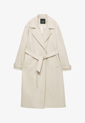 Kaput od vune boje kreme s pojasom u struku, širokim reverima i bočnim džepovima. Ima dugačke rukave i glatku, neukrašenu teksturu.