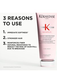 Kérastase Genesis haarconditioner in een roze tube met een zilveren onderkant. De tekst benadrukt de voordelen: zachtheid, sterker haar en minder risico op breuk.
