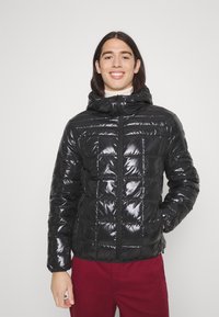 Calvin Klein SHINE QUILT JACKET HOOD - Casaco de penas - black