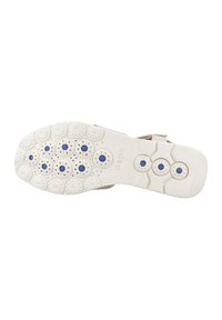 Suela de zapato GEOX en goma blanca, con agujeros de ventilación circulares azules y un patrón texturizado en la parte inferior para agarre y transpirabilidad.