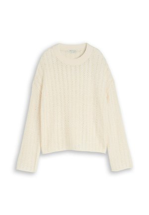 Pull tricoté de couleur crème avec manches longues et encolure ronde, présentant un motif texturé en ajouré.