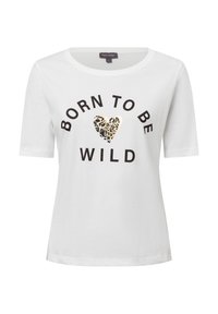 White short-sleeve t-shirt with "BORN TO BE WILD" text in black and a metallic leopard print heart accent in the center. Soft cotton material.