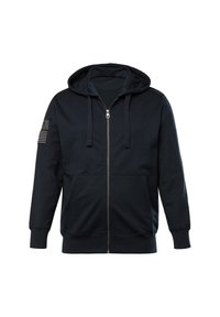Navy blue zip-up hoodie with a drawstring hood, front pockets, and a textured fabric. Features a USA graphic and stripes on one sleeve.