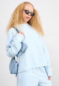 New Balance LINEAR HERITAGE BRUSHED BACK CREWNECK - Sportska majica - quarry blue