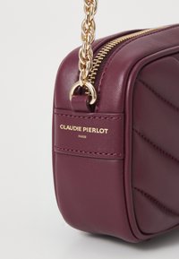 Claudie Pierlot Olkalaukku - bordeaux