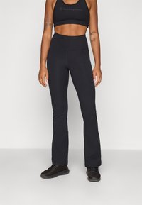 Champion TRAINING FLARE LEGGINGS INTERLOCK - Leggings - black