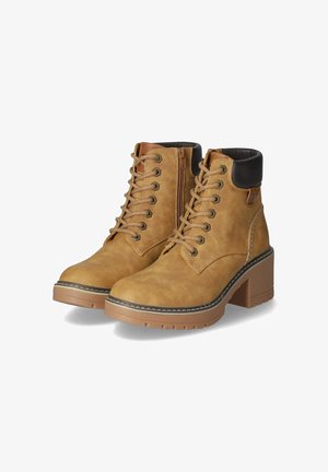 Tan ankle boots made of textured synthetic material, featuring black accents, a lace-up front, side zipper, and a chunky heel.