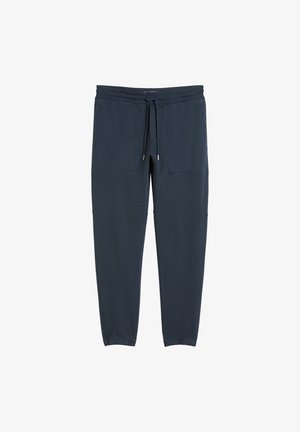 Marine joggers gemaakt van zachte stof, met een trekkoord in de taille, twee grote voortassen en elastische boorden bij de enkels.