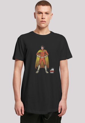 Black cotton t-shirt featuring a colorful superhero graphic in orange and yellow with metallic accents, from "The Big Bang Theory."