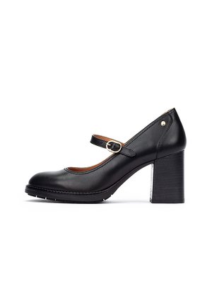 Escarpins Mary Jane en cuir noir avec un bout arrondi, une bride au niveau de la cheville dotée d'une boucle dorée, et un talon épais noir.