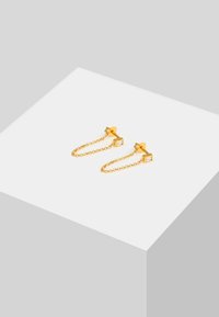Ohrringe aus einer goldenen Kette mit Akzenten aus kubischem Zirkonia, im quadratischen Design. Leicht mit einer polierten Oberfläche und filigranen Verbindungen.