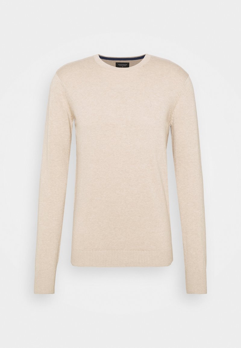 Pull beige à manches longues avec col rond, poignets et bas côte, fabriqué en tissu tricoté fin.