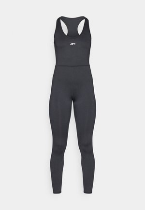 Svart atletisk bodysuit i stretchigt material med racerback-design, med en liten logotyp på bröstet och figurnära ben.