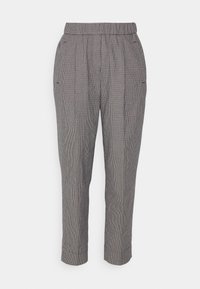 Tailored high-waist trousers with an elastic waistband, side pockets, and a small black-and-white houndstooth pattern.