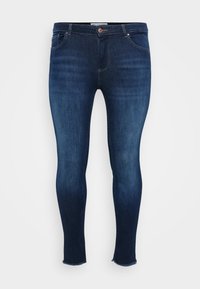 Dark blue jeans made of denim, featuring a slim fit, five-pocket design, and frayed hems for a casual look.