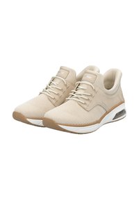 Scarpe sportive beige con tomaia in rete, collare imbottito, lacci elastici e una suola intermedia bianca con un'unità d'aria visibile e suola testurizzata.