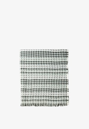 Sciarpa tessuta con motivo a scacchi in bianco e nero, caratterizzata da bordi frangiati e una texture morbida. Forma rettangolare, con linee audaci.