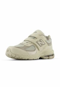 Men's sneakers with a beige mesh and synthetic upper, dual Velcro straps, cushioned sole, and textured outsole for traction.