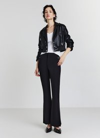 Calliope LUNGHI CON OCCHIELLI - Pantaloni - ultrablack