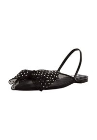 Sandales en maille noire avec un grand nœud à pois blancs, un design à bout ouvert et une fine bride arrière. Semelle plate.