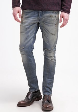 Jeans Tapered Fit - light-blue denim