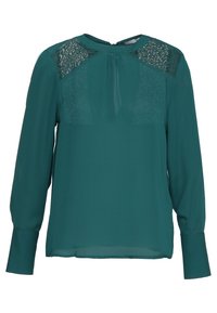 Tebladet blus i teal med långa ärmar, spetsdetaljer på axlarna, rundad halsringning och löst sittande design. Lätt och mjukt tyg.