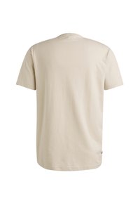 Camiseta de algodón beige con mangas cortas, un escote redondo y un dobladillo recto. Textura suave sin patrones o acentos visibles.