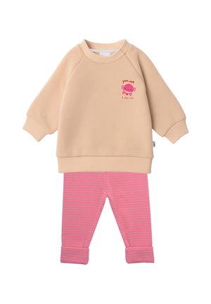 Beige long-sleeve top with crab graphic and text paired with pink and light blue striped pants with rolled cuffs for toddlers.