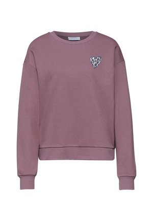 Laventelinvärinen pitkähihainen collegepaita resorilla hihoissa ja helmassa, vasemmassa rinnassa pieni sydämenmuotoinen mustavalkoinen leopardikuvioinen merkki.