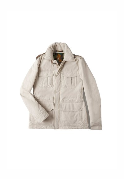 Lichtbeige jas met een rits aan de voorkant, twee borstzakken en twee onderste zakken. Bevat een brede kraag en schouderepauletten.