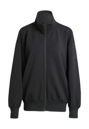 Svart zip-up sweatshirt med hög krage, lös passform, ribbade fållar och nederkant, samt en matt logotypaccent på vänster ärm. Mjuk tygtextur.