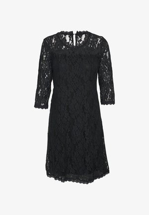 Musthave mustrõngastega must pitskleit, lillemustriga, laineliste servadega ja avaga seljal. Pehme tekstuur, põlvepikkune disain.