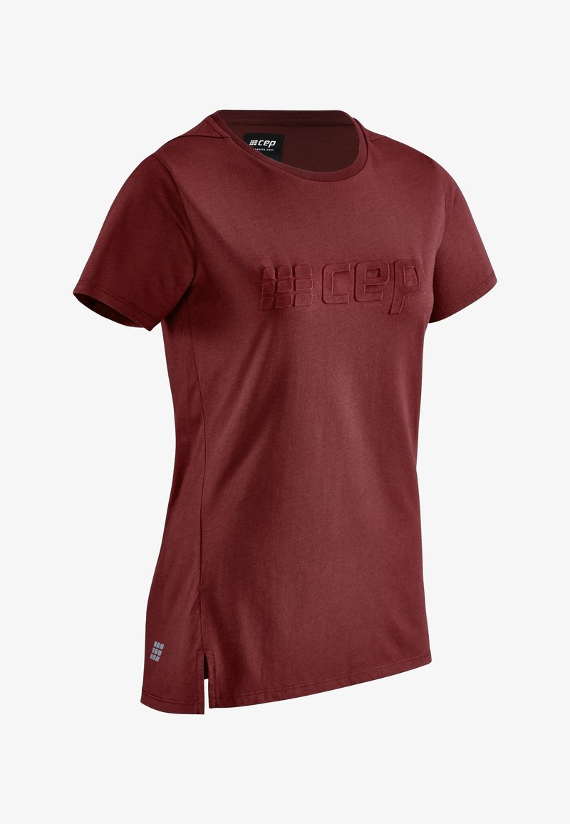 T-shirt de sport manches courtes bordeaux avec col rond et logo "cep" en relief sur la poitrine.