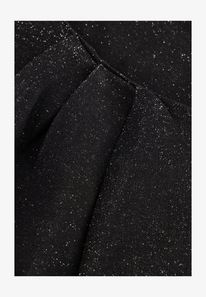 Black fabric with a subtle sparkly texture, featuring pleats that create depth. Surface has a fine, glimmering sheen with varied light reflections.