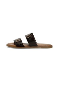 Brown leather sandals with two wide straps, each featuring a metallic buckle. Flat sole with a smooth brown base. Simple and minimalist design.