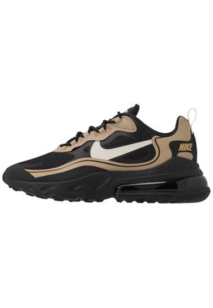 Black and tan Nike Air Max 270 React sneaker with white swoosh, mesh and leather upper, visible air cushioning in black sole.
