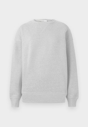 Lys grå hettegenser med rund hals, ribbede mansjetter og nederkant, laget av et mykt stoff med teksturert finish og løs passform.