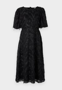 Robe noire avec une jupe midi, présentant un motif texturé en franges avec un design en zigzag et des manches courtes. Fermeture au niveau de l'encolure au dos visible.