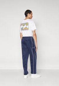 HUF WIREFRAME TRACK PANT UNISEX - Joggebukse - navy