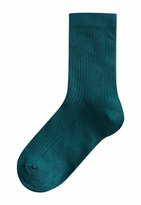 Chaussette bord-côte couleur sarcelle avec renforts au niveau des orteils et du bord, présentée sur fond blanc.