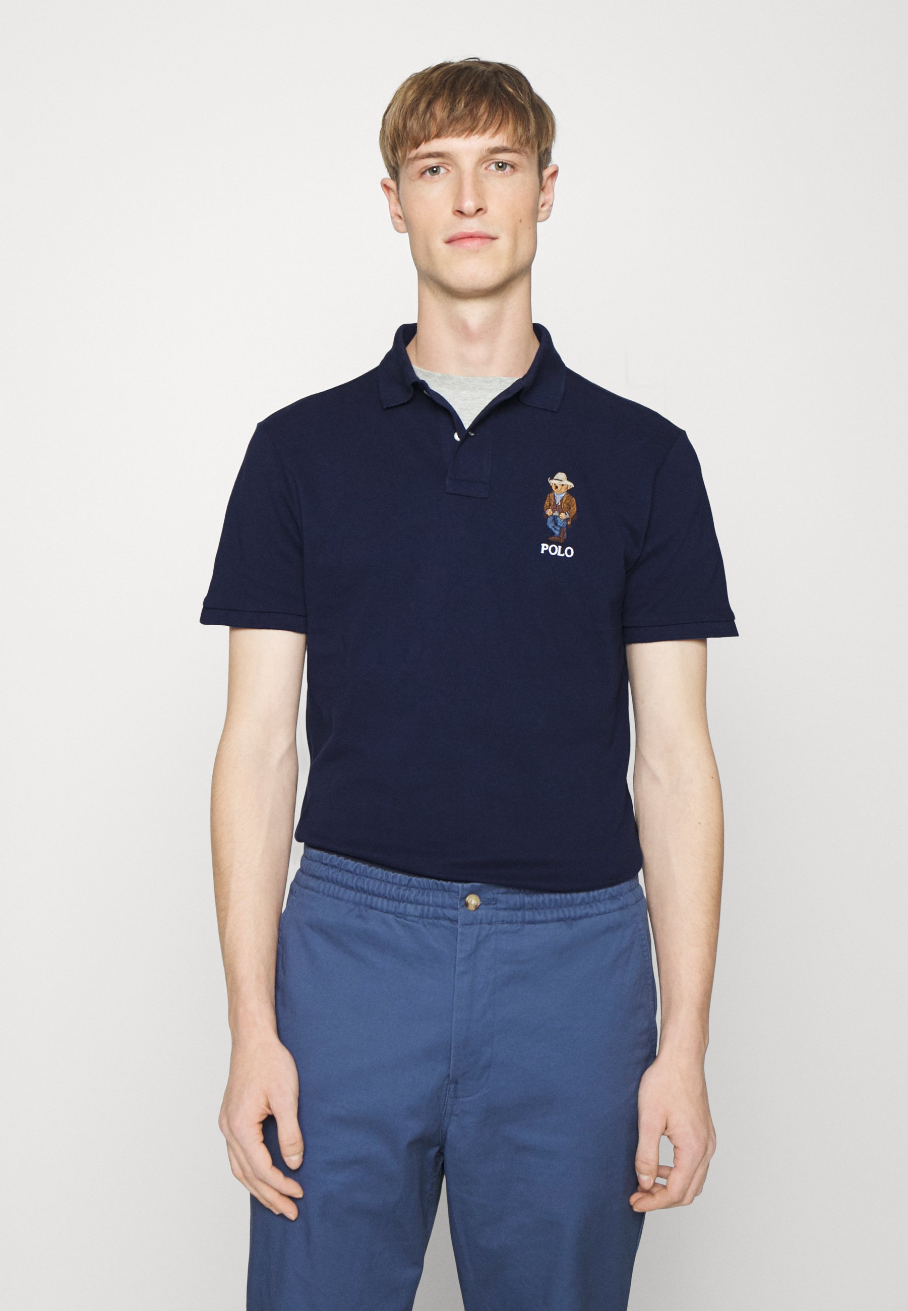 Blue polo shirt with bear Clearance