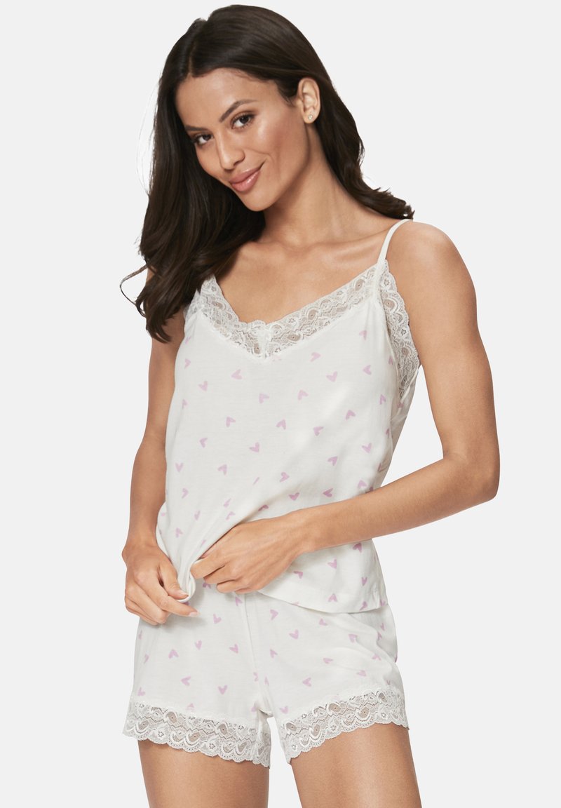 White pajama set with lavender heart patterns, featuring lace trim on the camisole and shorts, and adjustable straps for fit.