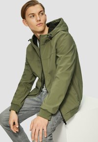 Olivgrüne, kapuzenjacke mit Reißverschluss vorne, seitlichen Taschen und gerippten Bündchen. Glattes Material mit strukturiertem Design und minimalen Nähten.