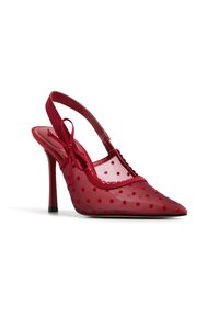 Zapatos de tacón tipo slingback rojos, elaborados en malla transparente con lunares. Punta afilada y detalles de borde ondulado, con un tacón alto delgado y un lazo decorativo.