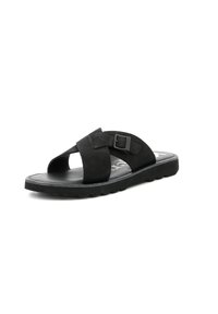 Sandalia de slide negra hecha de ante, con doble tira cruzada y hebilla ajustable. Cuenta con una suela de goma texturizada para mayor agarre y comodidad.