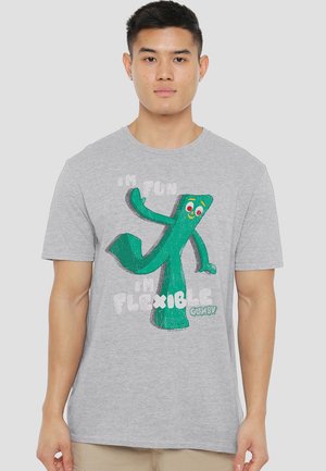 Graues Baumwoll-T-Shirt mit einem grünen Gumby-Logo und dem Text: "ICH BIN SPASSIG, ICH BIN FLEXIBEL" in Weiß, mit einem runden Halsausschnitt und kurzen Ärmeln.