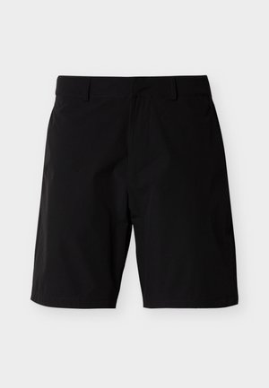 Svarte shorts laget av lett stoff, med et flatt frontdesign og sidelommer. Jevn tekstur med sydd detaljering.