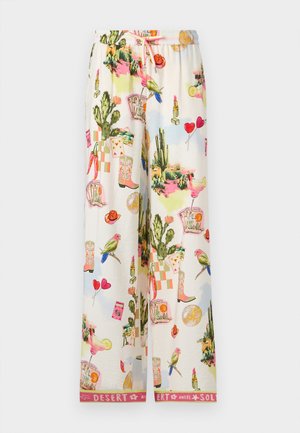 Wide-leg pants with colorful desert-themed print including cacti, birds, cowboy boots, cocktails, lipstick, and playing cards on white fabric.