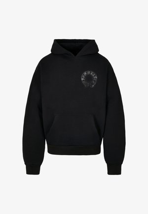 Juoda gobtuvas su priekiniais kišenėmis, su apvaliomis grafikomis krūtinėje. Pagamintas iš minkštos, tekstūruotos medžiagos su gumuotais rankovėmis.