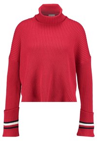 Czerwony sweter z golfem, prążkowany, o skróconym kroju, z szerokimi rękawami i paskami w kolorze granatowym, białym oraz czerwonym na mankietach. Miękka tekstura.